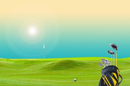golf equipment on green and hole as background. vintage toneの写真素材