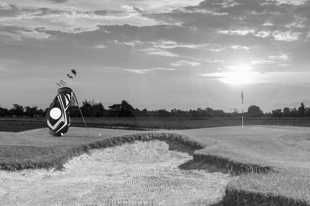 Golf equipment and golf bag ,putter ,ball on green as  golf course  background.の写真素材