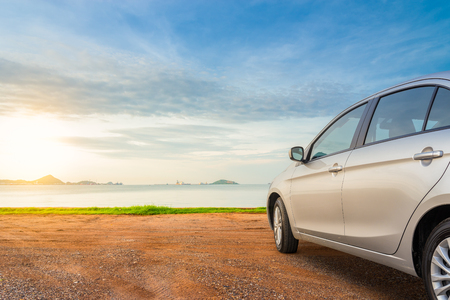 Rear view of the car over sea view on summer roadtrip to the beach  in the morning. tourism and travel concepts.の写真素材