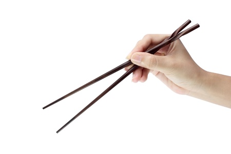 Hand holding chopsticksの写真素材