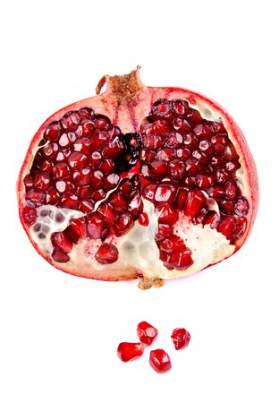 Ripe pomegranates with leaves isolated on a white background. の写真素材