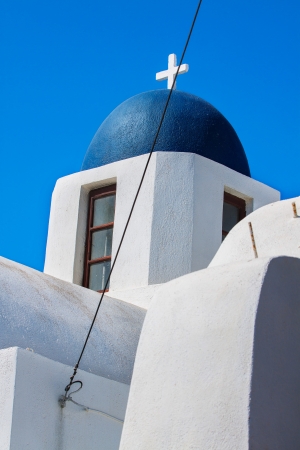 Blue church of Oia village at Santorini island. Greeceの写真素材