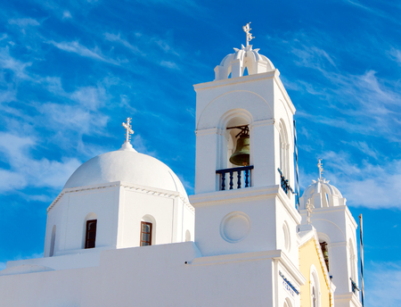 Traditional blue dome church in Santorini Greece の写真素材