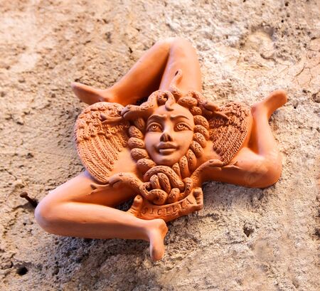 Close up view of typical sicilian ceramic souvenirs in a street of Cefalu, Sicilyの写真素材