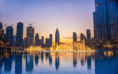 The Dubai Fountain is the world's largest choreographed fountain system, at the center of the Downtown Dubai. Set in Burj Khalifa Lake, right outside The Dubai Mallのeditorial素材