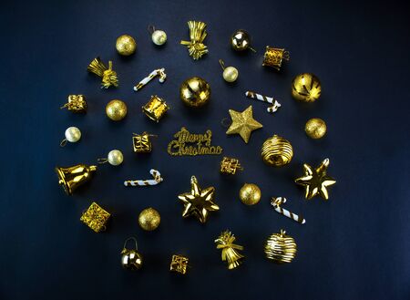 Christmas Decoration Items with Black Background, Gift Box Gold And Red Color Ball Flat lay Top Viewの写真素材