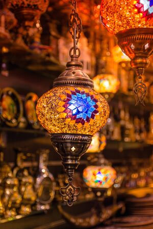 Beautiful Hanging crystal Light Lamp with colorful yellow background Ramadan Eid Concept Turkish Traditional Handicraft Lampの写真素材