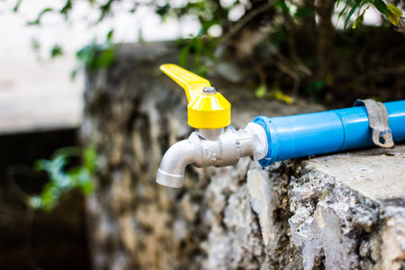 Closed water tap and PVC pipeの写真素材