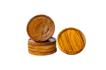 Wooden glass coasters  on isolated background.の写真素材