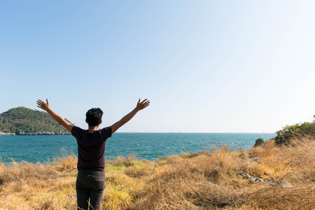 man is stand and looking beauty islandの写真素材