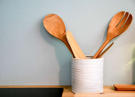 wood ladle and wood folk in the kitchenの写真素材