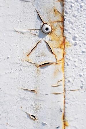 Closeup of cracked and peeling paint on an old carの写真素材