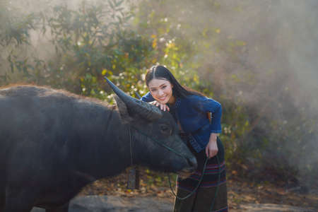 Asian women wearing Thai traditional dress , Thailandの写真素材