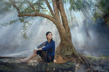 Asian women wearing Thai traditional dress , Thailandの写真素材