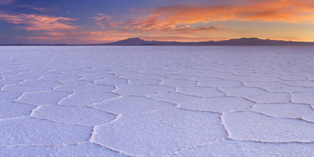 The world's largest salt flat, Salar de Uyuni in Bolivia, photographed at sunrise.の写真素材