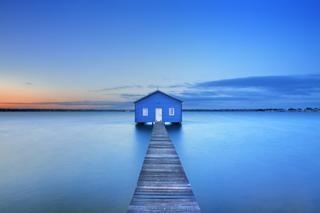 Sunrise over the Matilda Bay boathouse in the Swan River in Perth, Western Australia.の写真素材