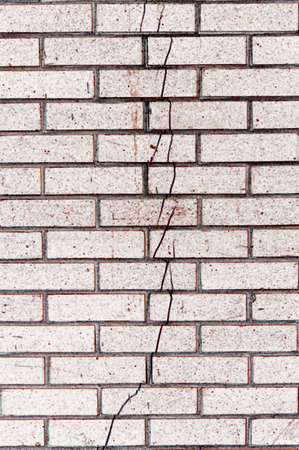 Brick wall background show detail of buildingの写真素材