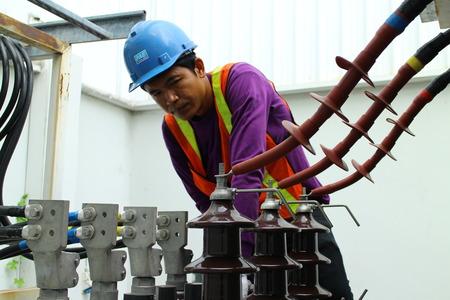 Rayong Thailand , February 26 - 2017 : worker working on electrical transformar high voltage and...