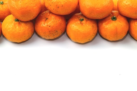 Orange sweet fruit on white background.の写真素材