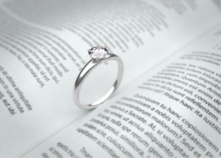 Wedding ring on the book page. 3D illustrationの写真素材