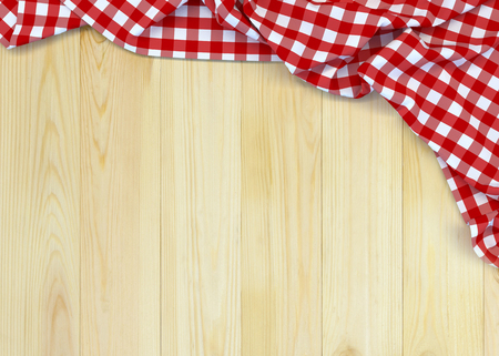 Red and white checkered fabric on wooden table. 3D illustrationの写真素材