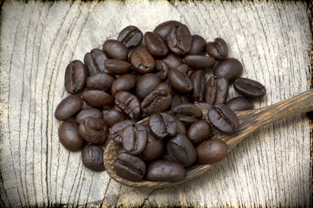 coffee beans on woodの写真素材