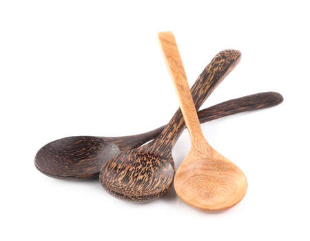 Wooden spoon isolated on white backgroundの写真素材