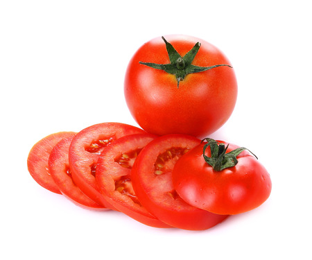 red tomato vegetable with cut isolated on white background.の写真素材