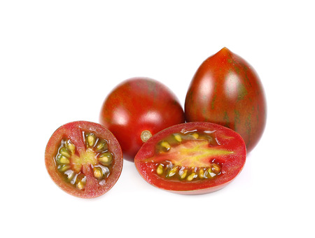 Chocolate Tomato or Brown color tomato on white background.の写真素材
