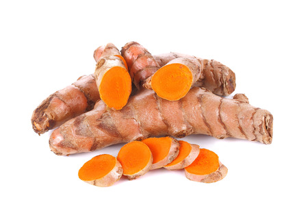 fresh turmeric, curcuma roots on white background.の写真素材