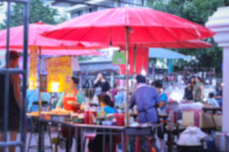 blur street food at walking street market chiangmai Thailand.の写真素材