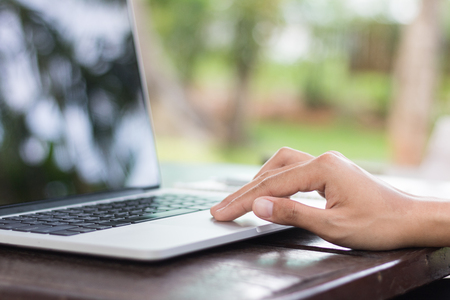 Business woman use laptop working in coffee shop vintage tone.の写真素材