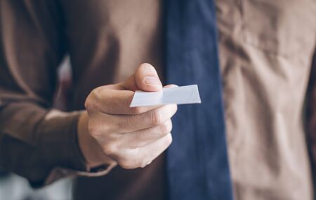 Close up businessman give business card for customer.の写真素材