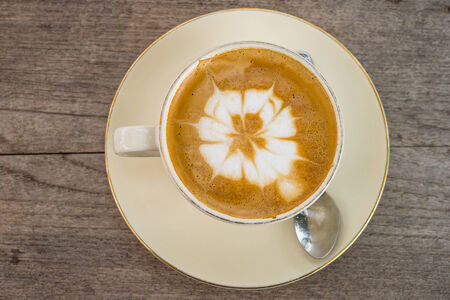 Mocha coffee drink on the table light wood.の写真素材