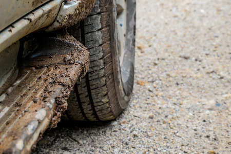 Wheels and stairs dirty mud in the rainy season..の写真素材