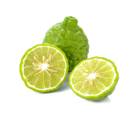 Kaffir lime cut half,Full ball placed on white background.の写真素材