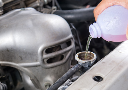 Add water to car  radiator,Check water car radiator.の写真素材