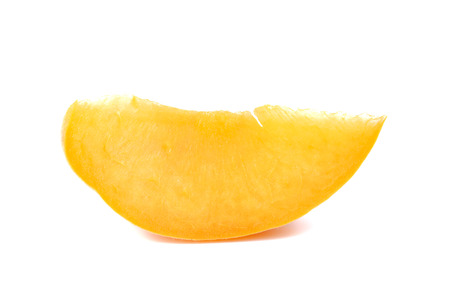 Yellow peach,Peach cut pieces isolated on white background.の写真素材