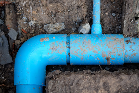 Install PVC water pipes blue in the ground.の写真素材