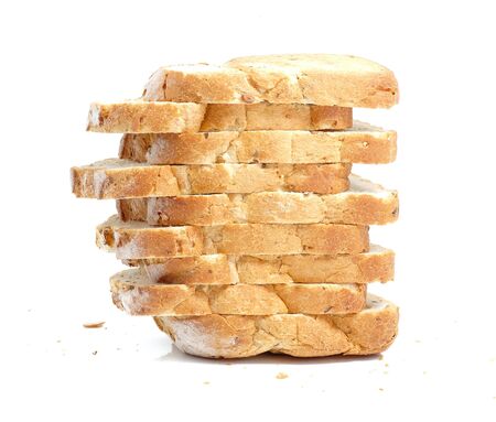 Sliced bread vertical drop on white background.