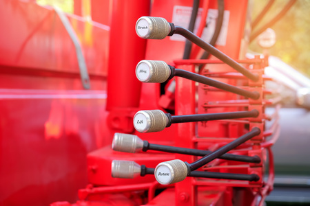 Hands controlled hydraulics crane on car.の写真素材