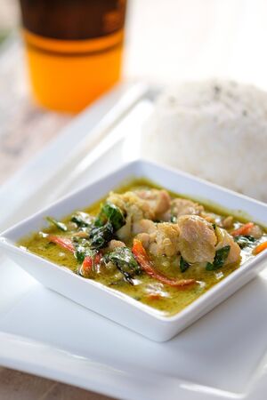 Thai green curry with pork with rice.の写真素材