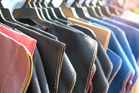 Shirts made of cotton on a hanger on the local market.