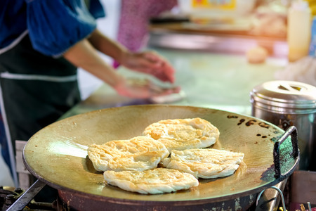 Roti dishes made from flour in the local market.の写真素材