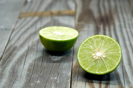 Lemons slice on wooden floor.の写真素材