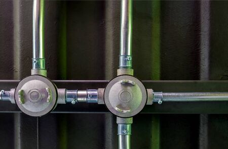 Electrical conduit work On steel beams and metal sheet roofs,style loft.の写真素材