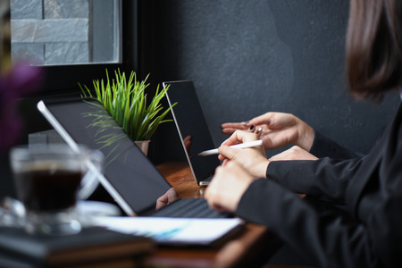 Business girl team working with laptop in office.business concepts.の写真素材