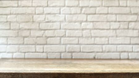 Wooden floor and white brick wall for advertising background.