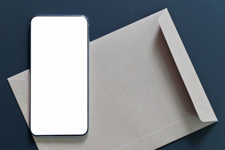 close - up shot of Mockup laptop blank screen with alcohol gel on a wooden table.の写真素材