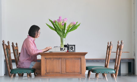 Female farmers carrying melon baskets to prepare to deliver to customers.の写真素材